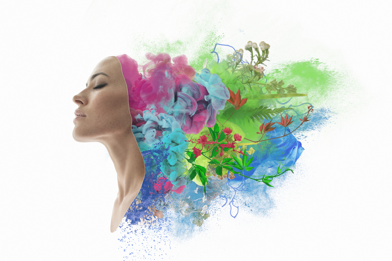 Woman with colours swirling around her