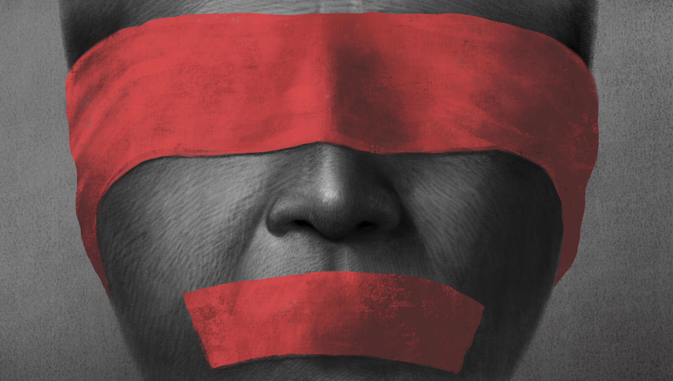 Grey image of man with red blindfold and gag