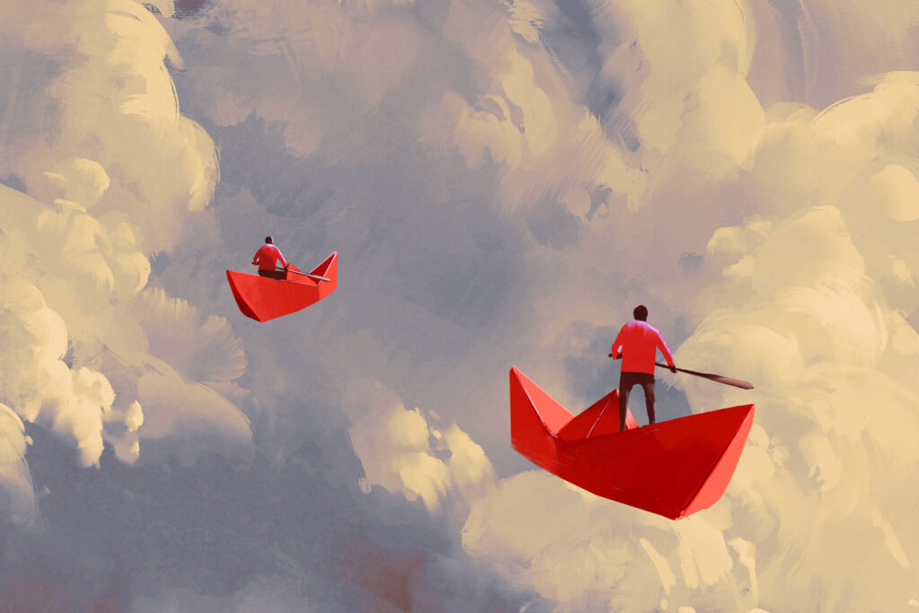 Men in red paper boats sailing across the clouds
