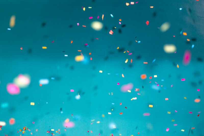 selective focus photography of multicolored confetti lot: learning culture