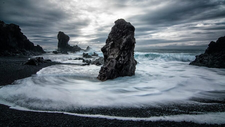 stony beach during cloudy day, DEI backlash