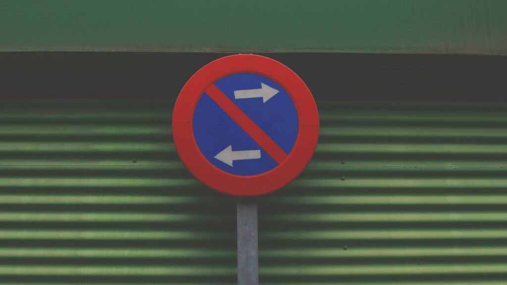 sign prohibiting going left or right, conscious unbossing