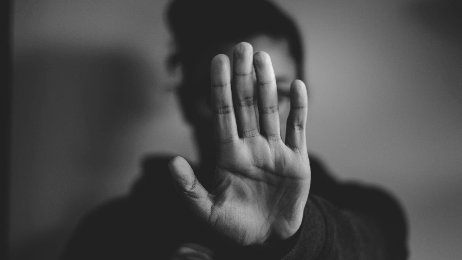 domestic abuse, close-up photography of person lifting hands