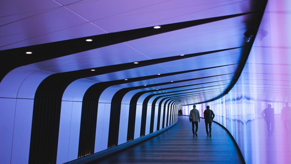 man walking through pathway, WEF Future of Jobs Report 2025