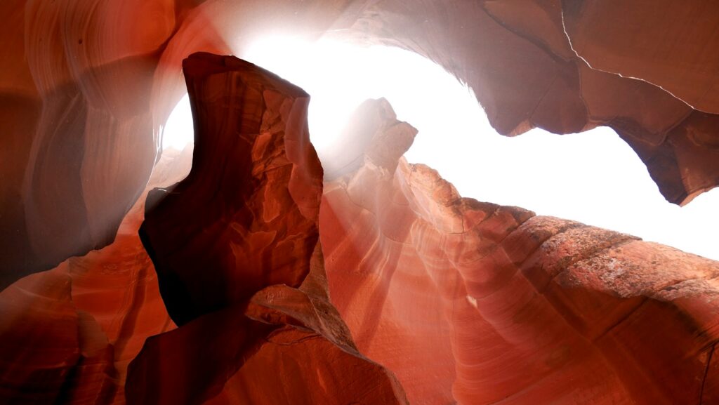 red rock formation low angle photography, pay gap reporting