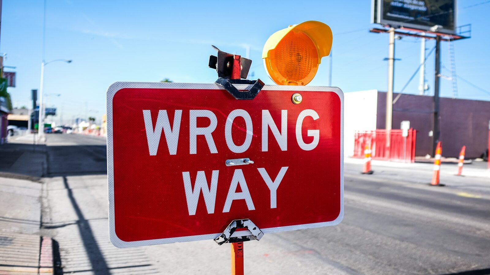 red Wrong Way signage on road
