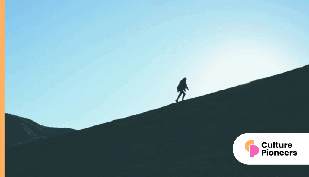 silhouette of man climbing hill - depicting Refresco case study of benefits satisfaction increase