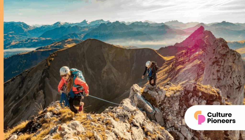 2 men hiking on mountain during daytime, depicting psychological safety