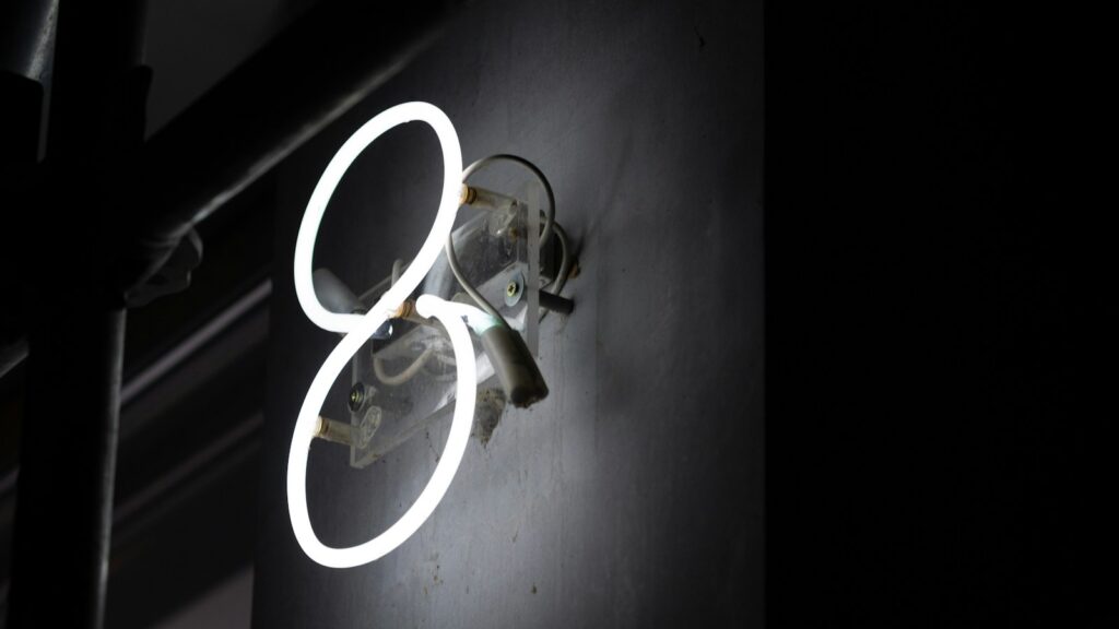 a close up of a light on a wall