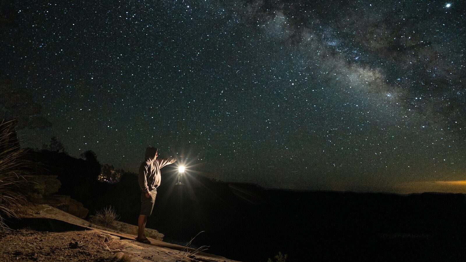 person holding lantern